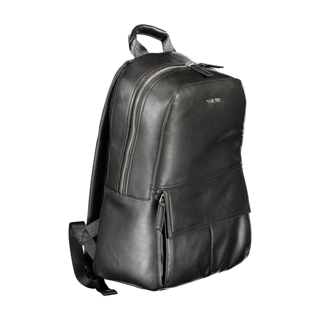 Calvin Klein Black Polyester Men Backpack with sleek design, adjustable straps, and multiple compartments for urban explorers.
