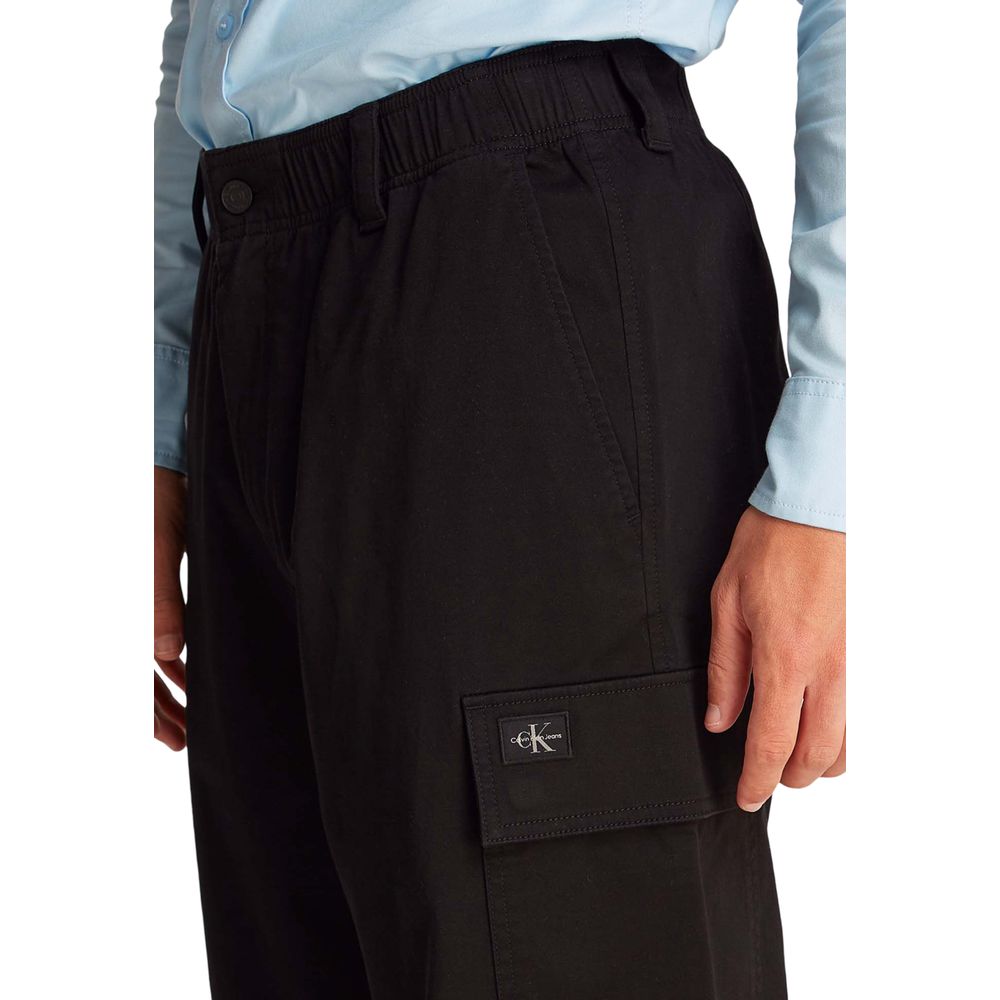Close-up of Calvin Klein Jeans Black Cotton Cargo Pants with logo detail and side pocket, showcasing comfortable fit and quality design.