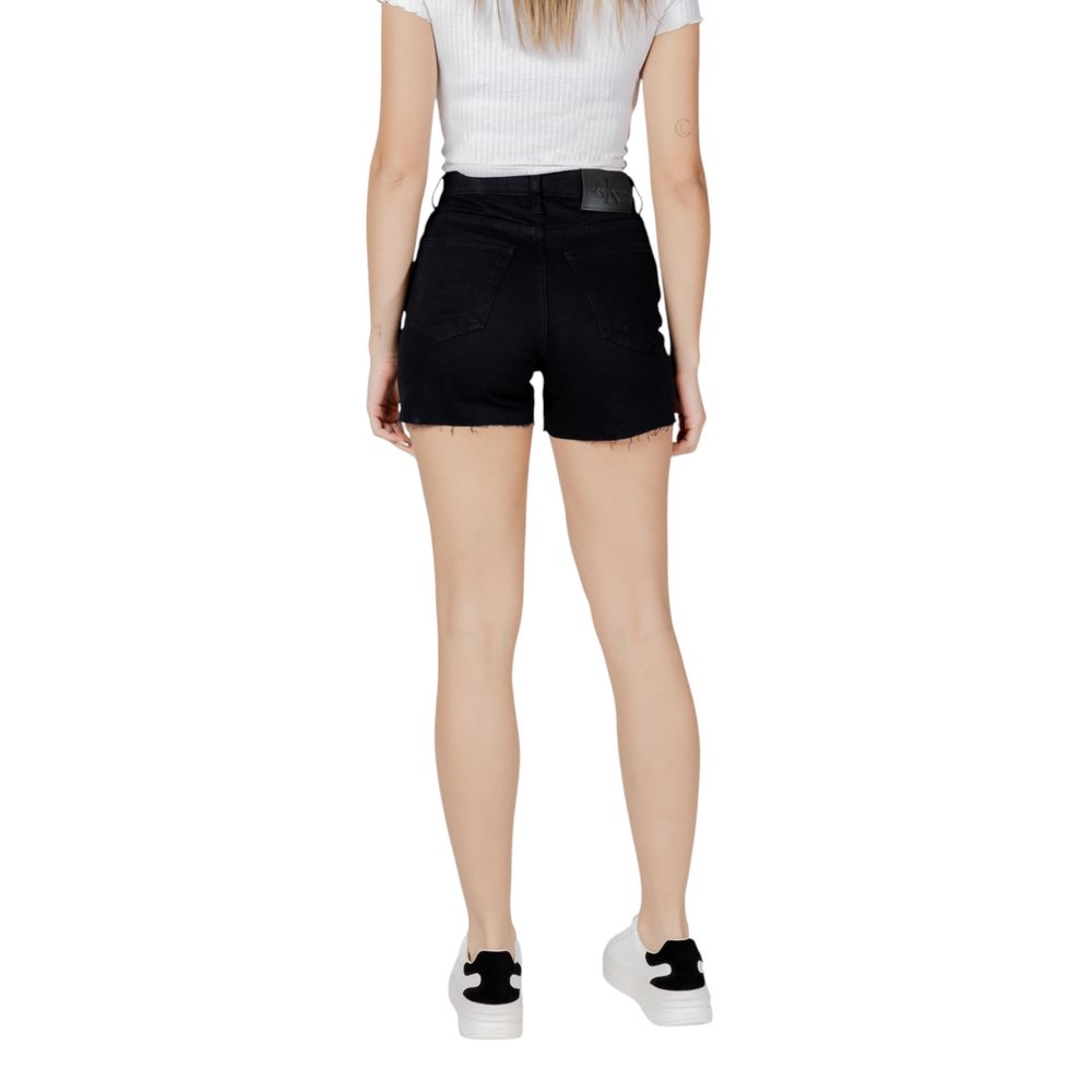 Rear view of model wearing Calvin Klein Jeans Black Cotton Shorts, showcasing a modern and versatile design for summer.
