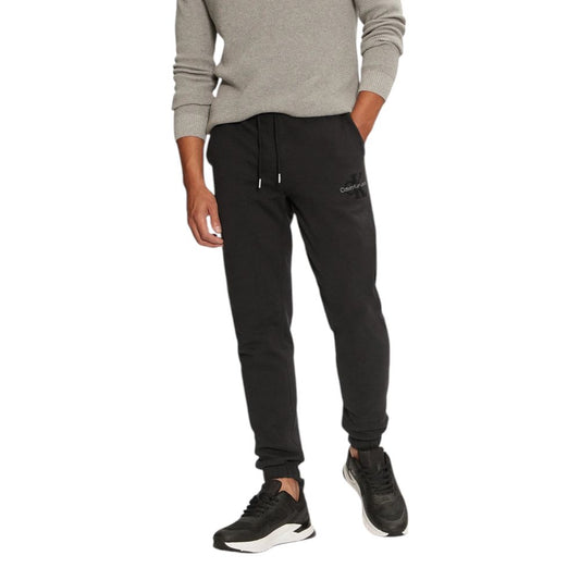 Calvin Klein Jeans Black Organic Cotton Joggers (Workout Pants) for men, featuring logo detail, ideal for casual or fitness wear.