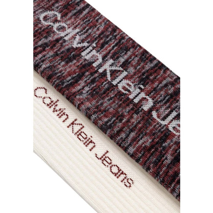 Two pairs of Calvin Klein Jeans Cream Cotton Socks, showcasing textured and cream designs for a stylish and comfortable fit.