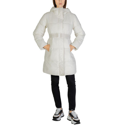 Woman wearing Calvin Klein Jeans Cream Nylon Coat with logo belt, showcasing stylish and warm outerwear.