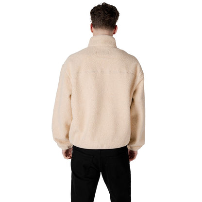 Back view of Calvin Klein Jeans Cream Recycled Polyester Shell Jacket, showcasing sherpa texture and elastic cuffs for a modern sleek fit.