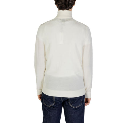 Back view of Calvin Klein Jeans Cream Wool Turtleneck for men, showcasing elegant minimalist design and high-quality wool fabric.
