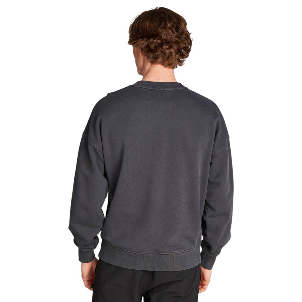 Back view of man wearing Calvin Klein Jeans Gray Cotton Sweatshirt with comfortable wide sleeves.