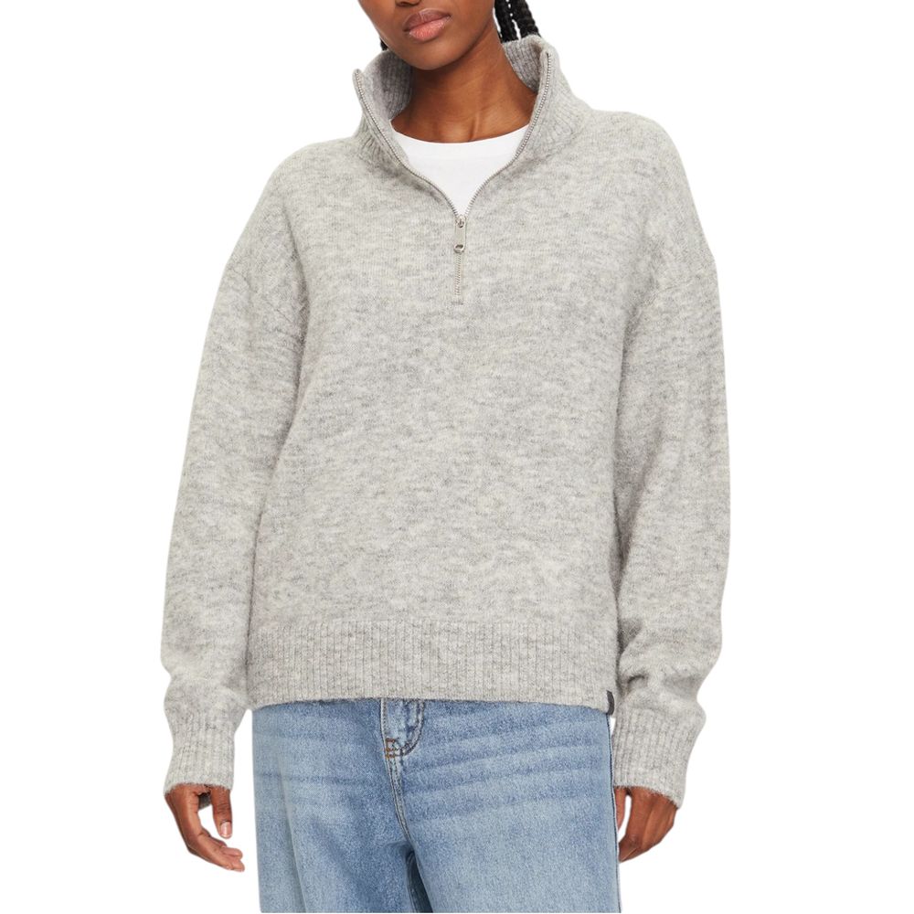 Woman wearing Calvin Klein Jeans Gray Polyester Cardigan with half-zip design, showcasing soft texture and relaxed fit for casual elegance.