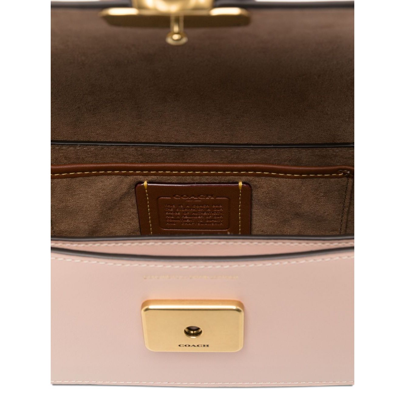 Front view with bag zipped and handles upright.
