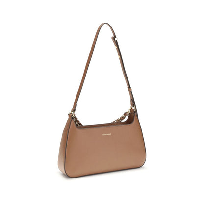 Coccinelle Beige Calf Leather Bos Taurus Shoulder Bag with gold chain handle, showcasing elegant and versatile design.