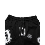 Dolce & Gabbana Black Logo Print Cotton Casual Bermuda Short with stylish white logo design, featuring drawstring closure.