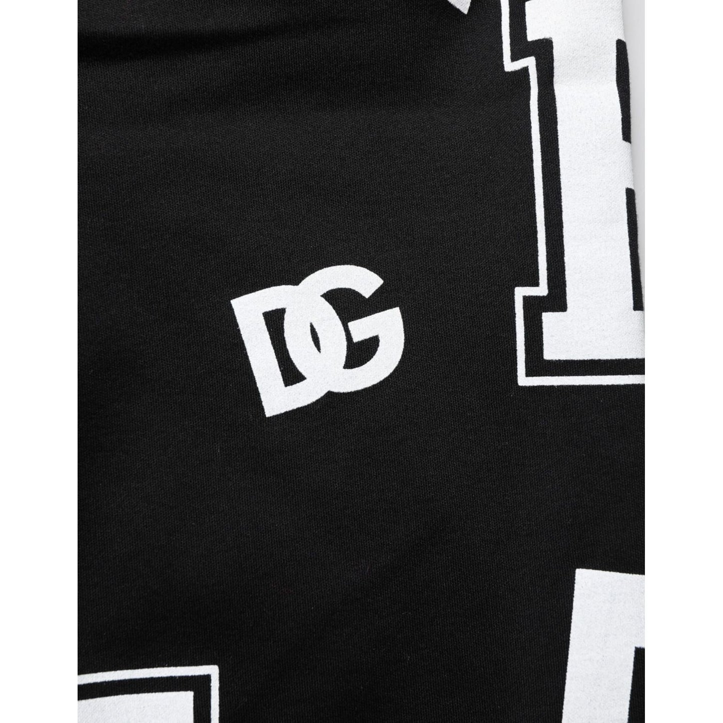 Dolce & Gabbana Black Logo Print Cotton Casual Bermuda Short with stylish white DG logo design on black fabric background.
