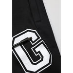 Close-up of Dolce & Gabbana Black Logo Print Cotton Casual Bermuda Short showing logo and drawstring detail.