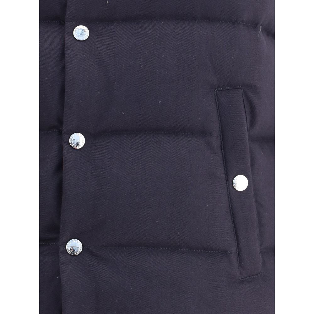 Close-up of Dolce & Gabbana Blue Cotton Jackets And Coat with snap button closure and quilted design.