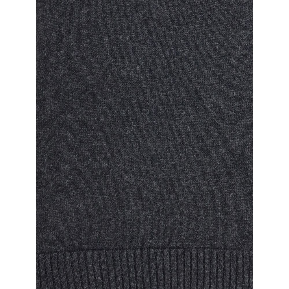 Close-up of Dolce & Gabbana Gray Fleece Wool Sweatshirt showcasing fine wool texture and ribbed hem detail for a refined look.