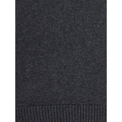 Close-up of Dolce & Gabbana Gray Fleece Wool Sweatshirt showcasing fine wool texture and ribbed hem detail for a refined look.
