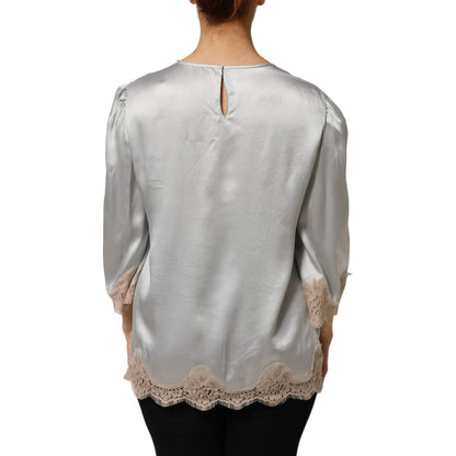 Dolce & Gabbana Gray Silk Satin Floral Lace Long Sleeve Top featuring delicate lace detailing on a model's back view.