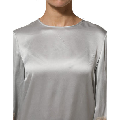 Dolce & Gabbana Gray Silk Satin Floral Lace Long Sleeve Top with round neck and delicate lace detailing.