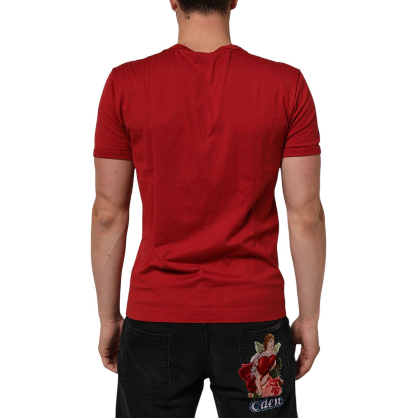 Back view of Dolce & Gabbana Red Crown Bee Cotton Short Sleeve T-shirt worn by model, showcasing design details.