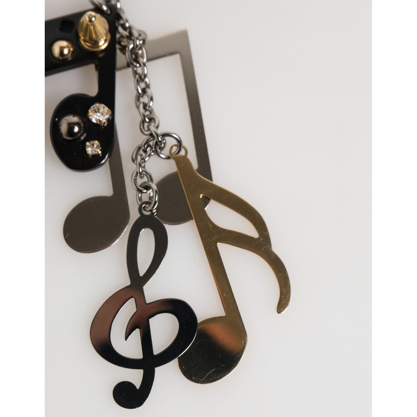 Dolce & Gabbana Silver Musical Note Key Holder Keychain Bag Charm Keyring in shiny silver finish with logo engraving and clasp.