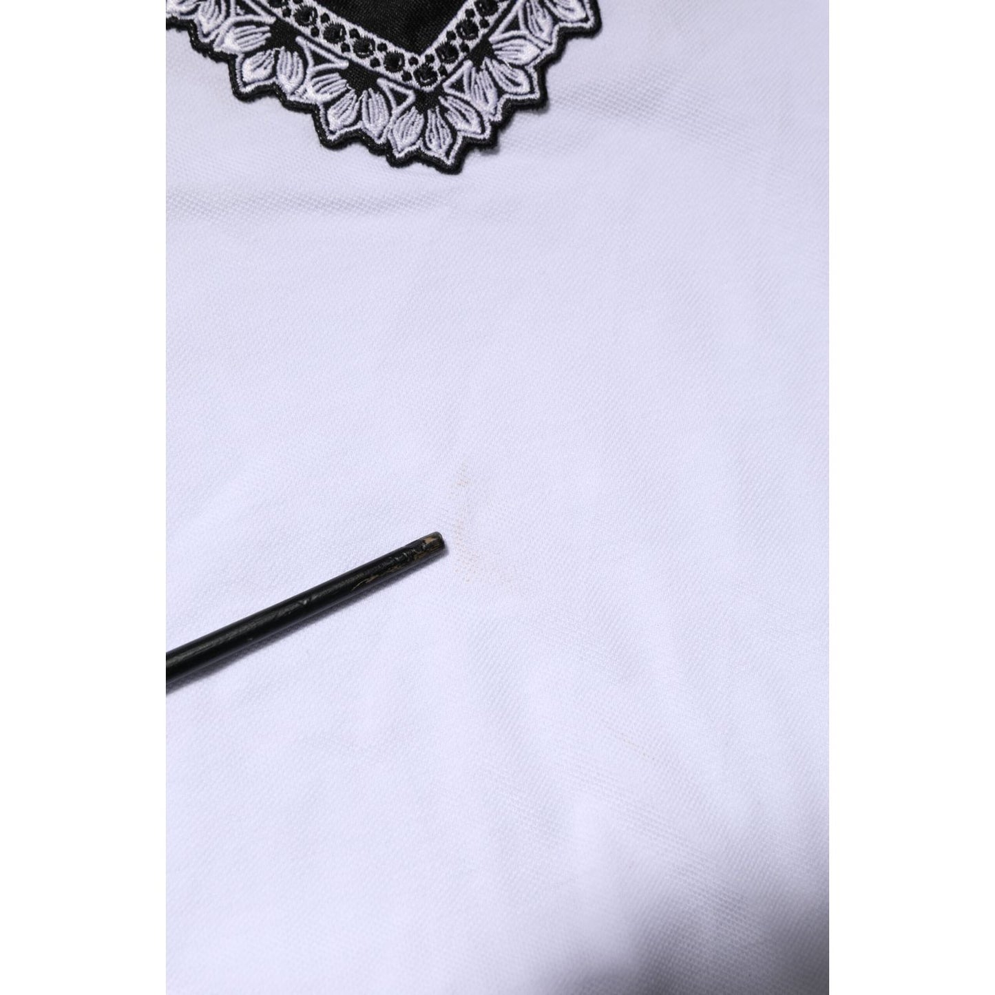 Close-up of Dolce & Gabbana White Cotton DG Heart Logo Embroider T-shirt detailing.
