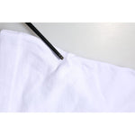 Close-up of Dolce & Gabbana White Cotton DG Heart Logo Embroider T-shirt fabric.