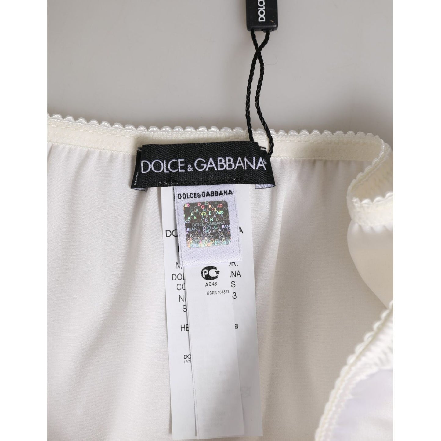 Dolce & Gabbana White Silk Satin Floral Lace Panty Brief Underwear with tags and lace trim detail, small stain visible.