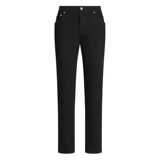 Dolce & Gabbana five pockets logo plaque Denim cotton jeans in black with button fastening and belt loops.