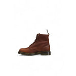 Dr. Martens Brown Leather Athletic 1460 Pascal boots with pebbled finish, classic 8-eyelet design, yellow stitching, and rubber sole.