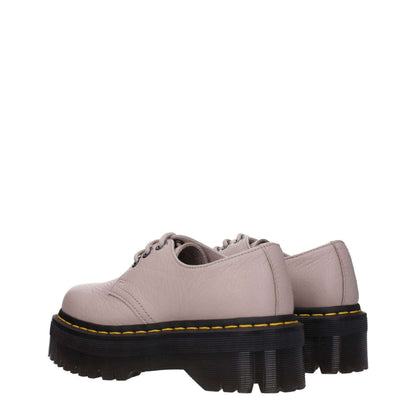Side view of Dr. Martens Gray Leather Oxfords And Derbies with thick rubber sole and mid heels, featuring lace up closure and round toe.