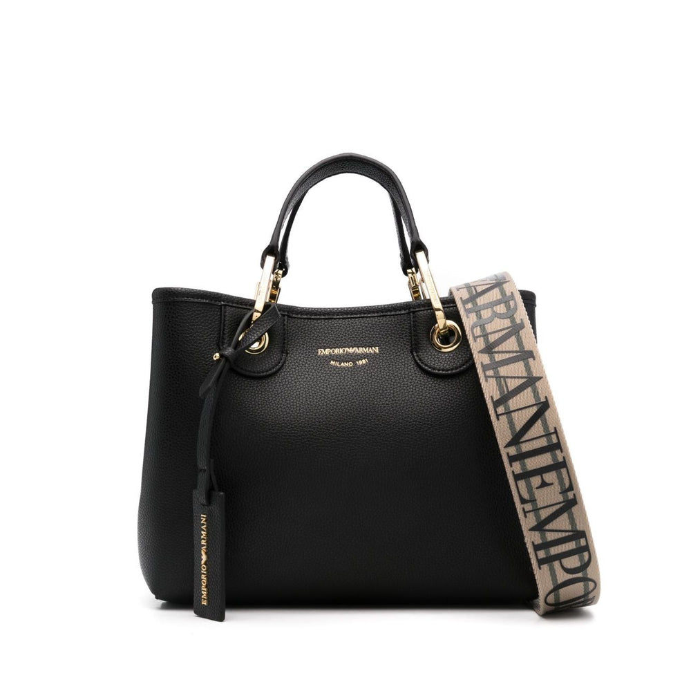 Emporio Armani MyEA small shopping bag in black faux leather with gold-tone hardware, detachable pouch, and adjustable logo strap.