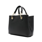Emporio Armani MyEA small shopping bag in black faux leather with gold-tone hardware, grained texture, and adjustable strap.