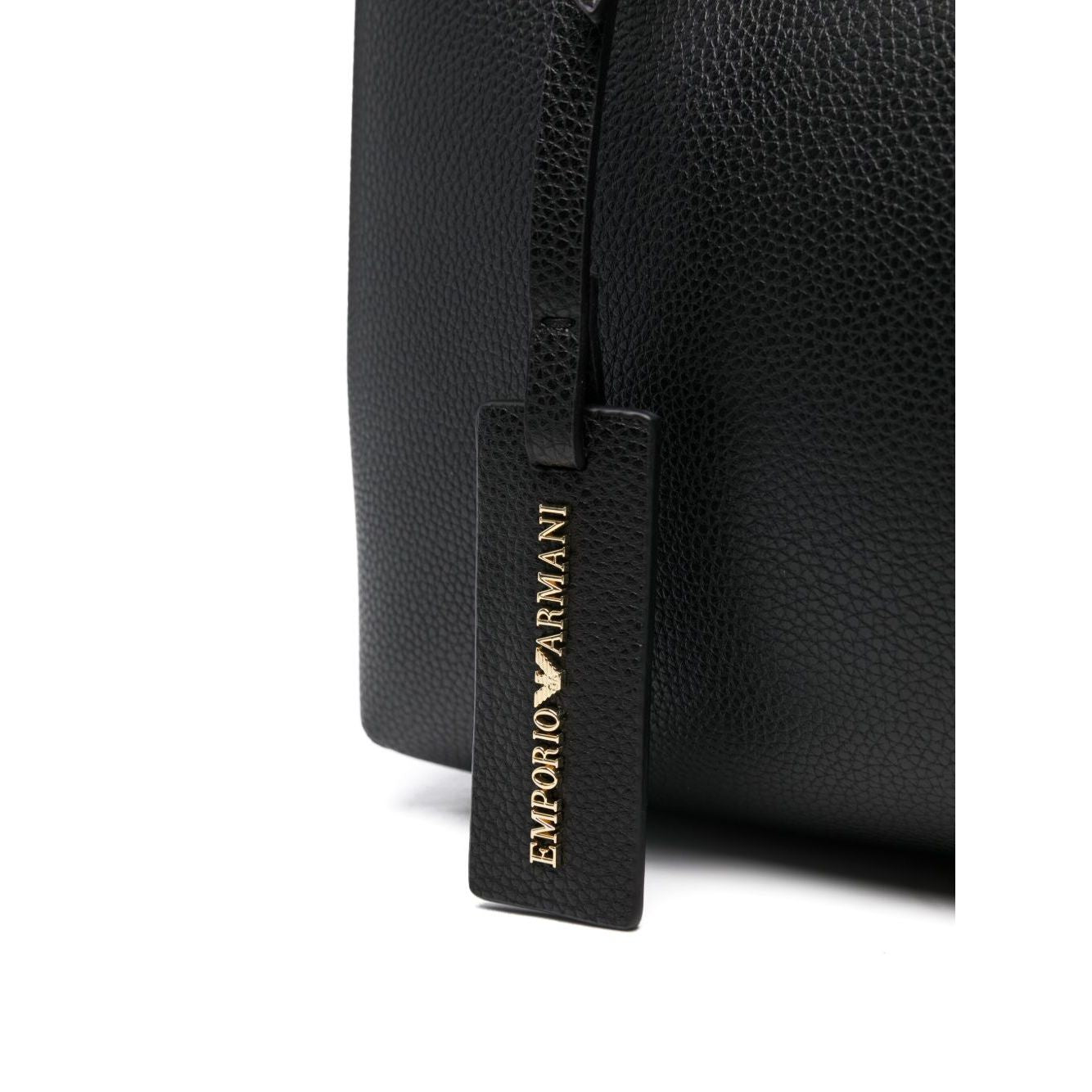 Emporio Armani MyEA small shopping bag in black faux leather with grained texture and gold debossed logo tag detail.
