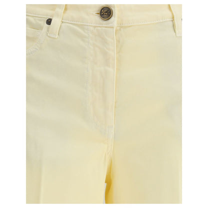 Close-up of Etro Yellow Cotton Straight-Leg Jeans showcasing button and zipper closure with belt loops.