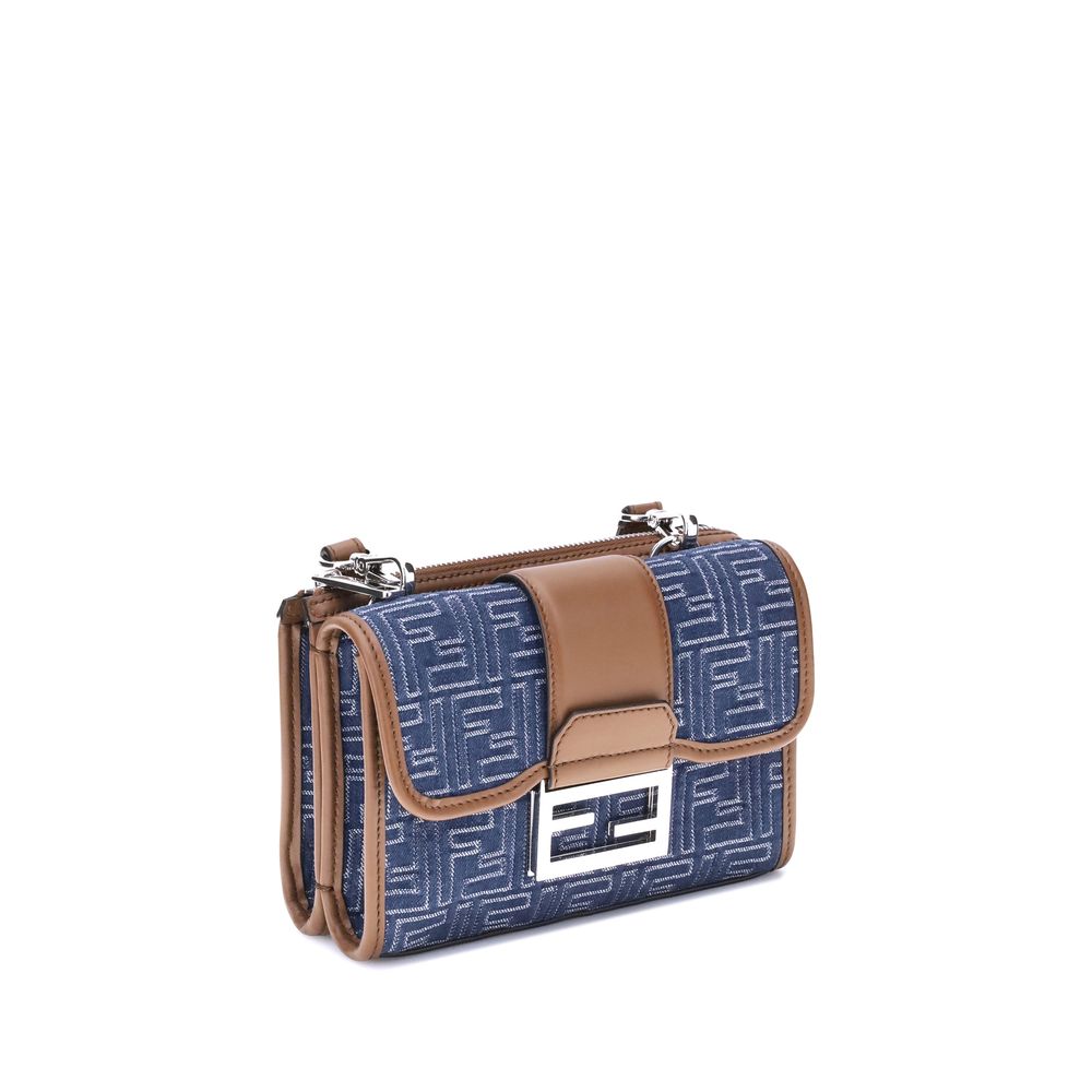 Fendi Baguette denim Shoulder Bag with FF Jacquard, featuring dual compartments and a magnetic closure for style and practicality.