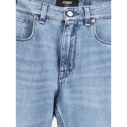 Fendi Light Blue Cotton Straight-Leg Jeans with slim fit, classic 5-pocket design, rivets, and custom buttons. 100% cotton.