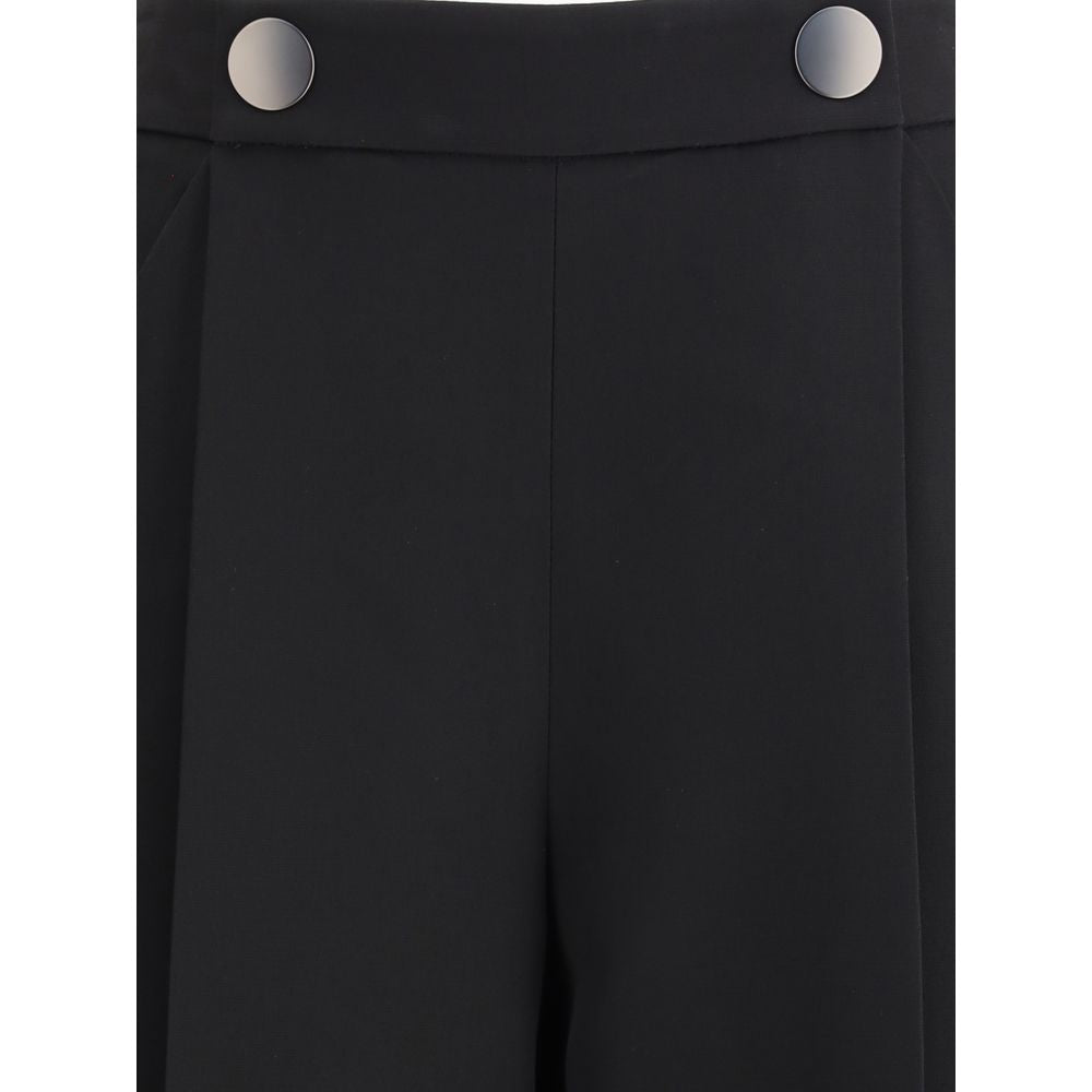 Front view of Giorgio Armani Black Silk Casual Pants with button details and side zipper closure for a sophisticated look.