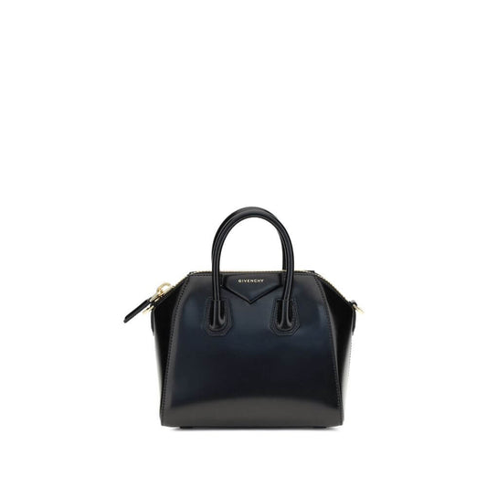Givenchy Black Calf Leather Bos Taurus Handbag with glossy design, geometric pattern, and iconic brand monogram on front.