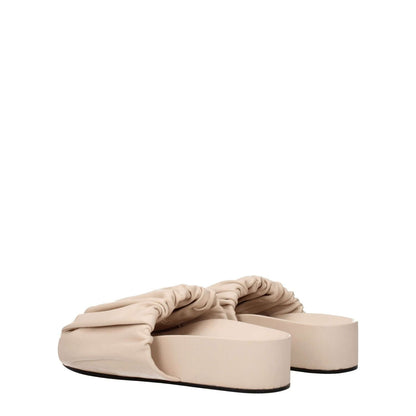 Jil Sander Pink Leather Slippers with open toe and mid heels, featuring a unique powder pink design in premium leather.