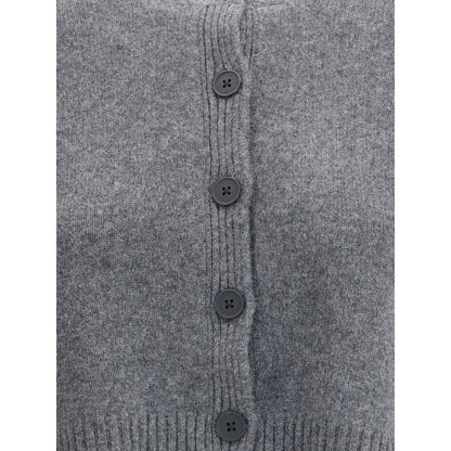 Close-up of Loulou De Saison Gray Cashmere Cardigan with button closure, featuring ribbed hem, showcasing texture and style details.