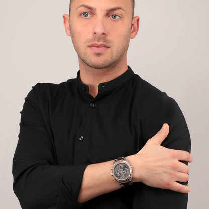 Gent wearing MASERATI MOD. R8853100020 quartz wristwatch, silver two-tone, multifunction, 43mm case, water-resistant 10 ATM, official packaging