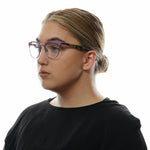 Woman wearing Police Purple Women Glasses Frame with full-rim plastic design and spring hinges.