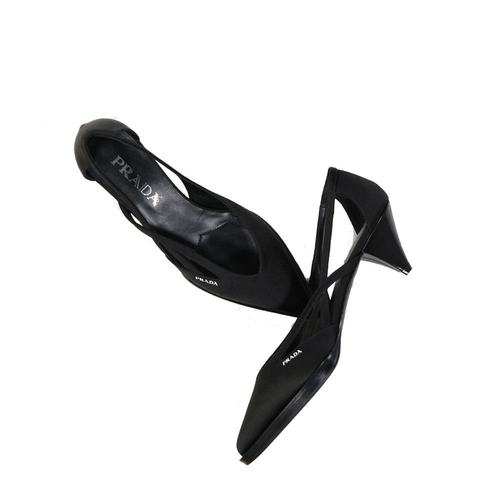 Prada Black Silk Mid Heel Pumps with pointed toe, cut-out detail, and slip-on design showcasing branded insole and side logo.