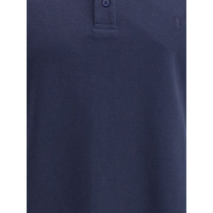 Saint Laurent Blue Cotton Polo Shirt with ribbed collar and embroidered Cassandre logo, featuring tone-on-tone buttons. Regular fit design.