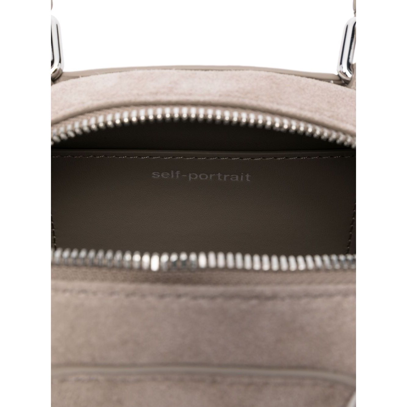Front view with bag zipped and handles upright.