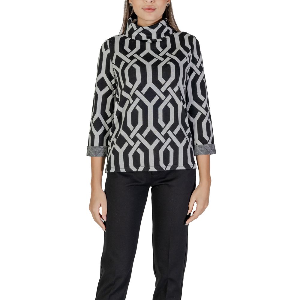 Woman wearing Street One Black Polyester Sweatshirt with jacquard pattern and scarf collar for stylish comfort.