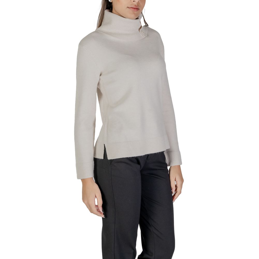 Street One Cream Viscose Turtleneck sweater with button details on high neck, shown on model. Cozy and stylish women's knit top for cooler days.