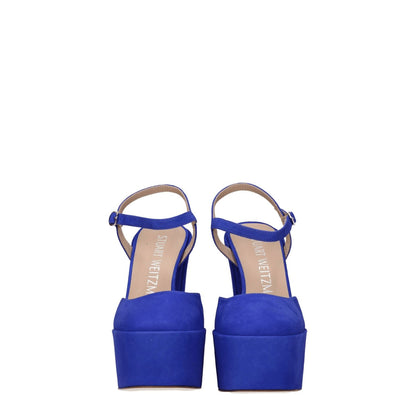 Stuart Weitzman Blue Leather Platform Sandals with high heel and buckle closure, crafted from suede with leather sole, front view.