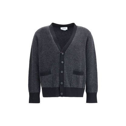Thom Browne Black Fleece Wool Cardigan with V-neckline and front button closure, ideal for sophisticated style in AW25 collection.