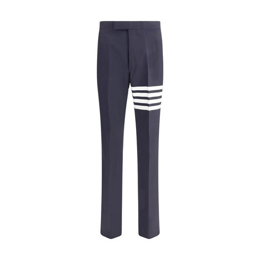Thom Browne Blue Wool Dress Pants with iconic stripe detail, featuring side slash and back welt pockets, ideal for a formal look.