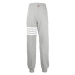 Thom Browne Trousers Grey with 4-Bar stripe and grosgrain loop tab, featuring cotton fabric and drawstring waist.