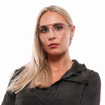 Woman wearing Tod's Silver Women Glasses Frame, 54-19-140 size, half-rim style with metal and plastic frame.